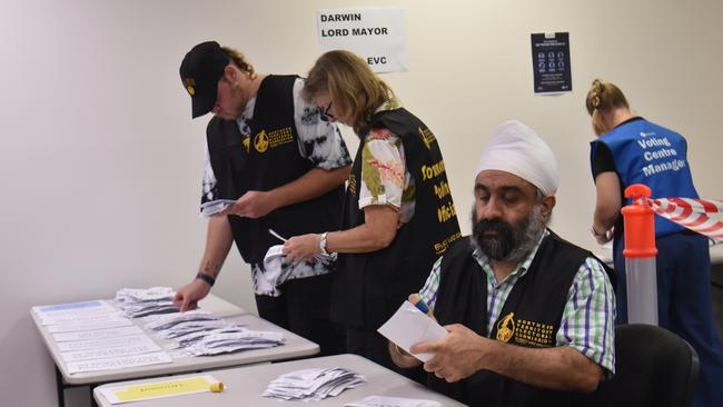 Counting in the Northern Territory local government elections. Picture: Thomas Morgan