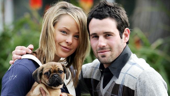 Lane - with Didak and their dog, Rocky - says their relationship issues were not unique among football couples.