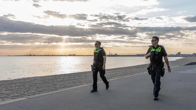 Police officers on patrol ensuring people do the right thing at St Kilda Beach. (Photo by Asanka Ratnayake/Getty Images)