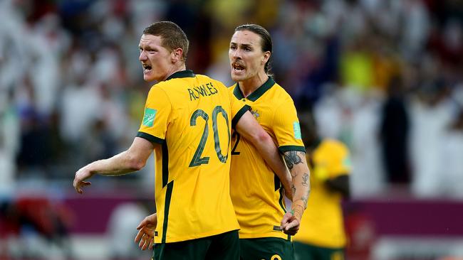 Kye Rowles (left) celebrates with Socceroos teammate Jackson Irvine at the World Cup playoffs in June. Picture: Mohamed Farag/Getty Images