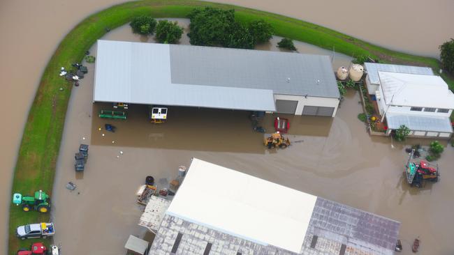 Premier of Queensland David Crisafulli heads for flood affected Cardwell onboard a helicopter to assess the damage, as seen here in the farming region around Macknade. Picture: NewsWire/Adam Head