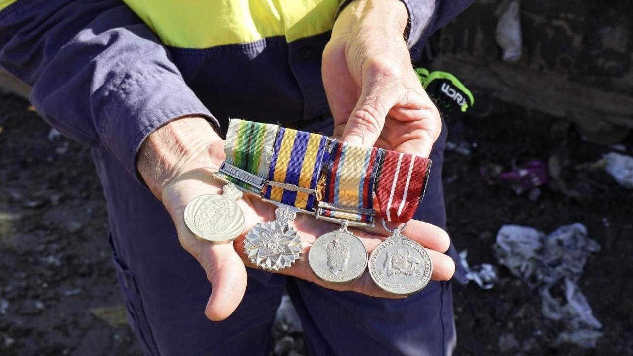 A Lockyer Valley Regional Council heavy machinery operator spotted an unusual container at Gatton Landfill, and discovered there were four war medals inside. Photo: LVRC.