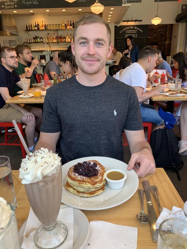 Devon Smith enjoys some New York pancakes. Picture: Supplied