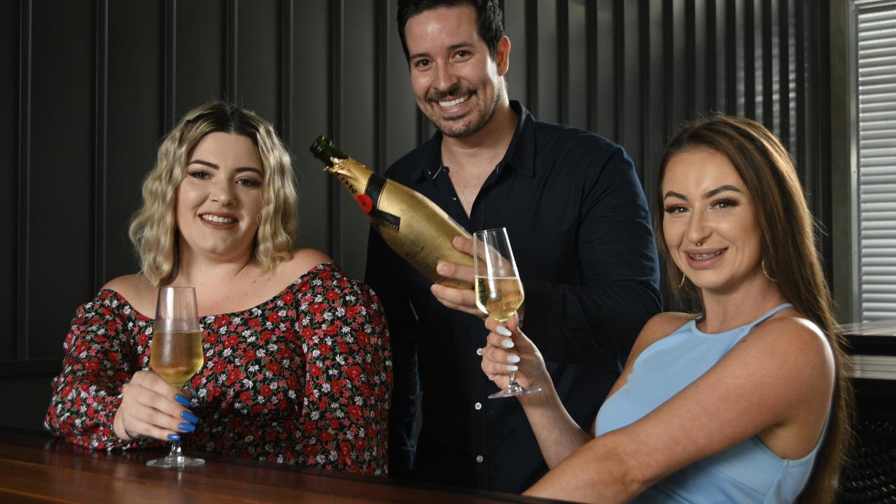 Enjoying champagne at The Rock, Tahlia McAvon (left) Matt Domingues and Ashleigh Osborn.