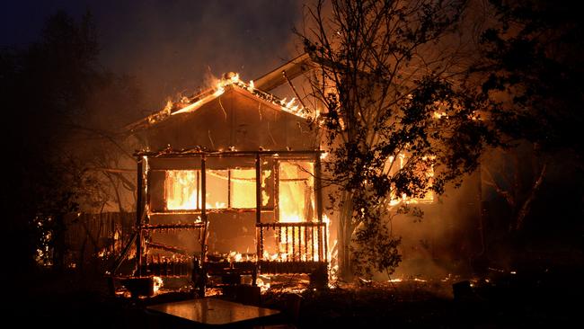 A house burns at Bilpin in the NSW Blue Mountains. Picture: Jeremy Piper