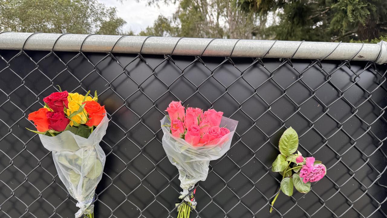 Tributes began to appear at the scene of the crash on Friday morning.