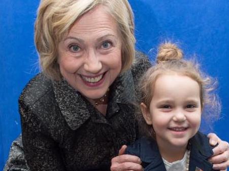 Hillary Clinton poses with four-year-old Sullivan at an event in Charleston. Sullivan has dressed up like Clinton for Hallowee. Picture: Facebook