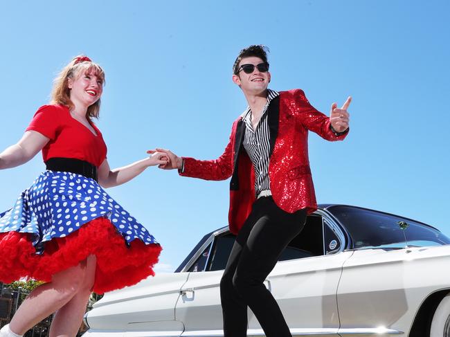 Gearing up for a big Fathers Day weekend of Classic Cars and good times at Carrara Markets are Jake Maloney 23 and Kya Maloney 15 from Rockabilly Australia in front of Milton Watkins' 1961 Cadillac. Picture Glenn Hampson