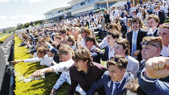 Punters in general admission go crazy after backing the winner. Picture: Sam Ruttyn