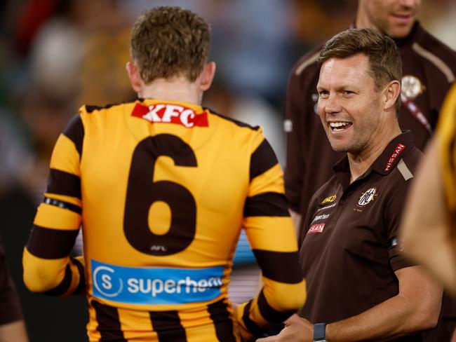 Sam Mitchell shares a smile with James Sicily. Picture: Michael Willson/AFL Photos via Getty Images.