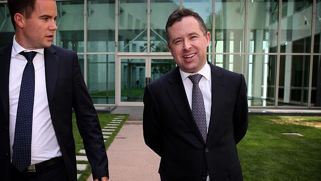 The negotiator ... Qantas chief executive Alan Joyce (right) in between meetings at Parliament House in Canberra.