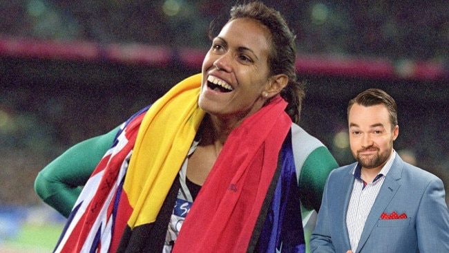 At the Sydney Olympics, Cathy Freeman won gold running what distance?