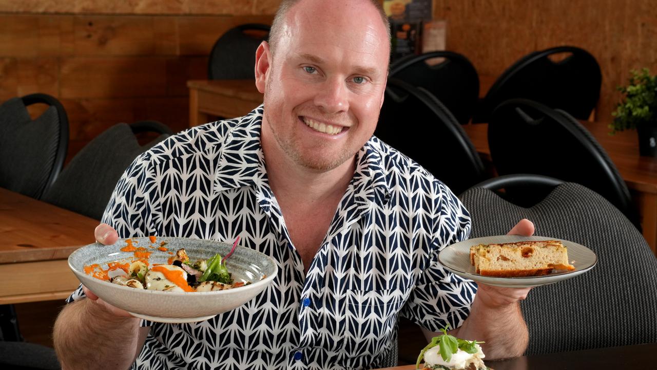 Foodie influencer Ben Holmes surrounded by food at The Pangaea Kitchen. Picture: Dean Martin