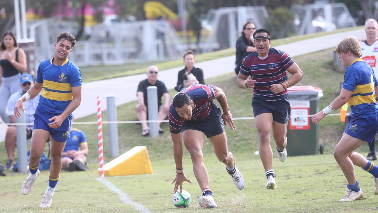 Kingston Seve (planting the ball) and Agapetos Lote-Felo (head strapping) pictured playing for TSS earlier this season. Picture by Richard Gosling