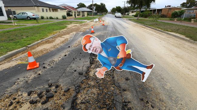 Substitute Ian Hunter heads north to Greenacres to inspect the burst main on Birdwood Rd. Picture: Tait Schmaal