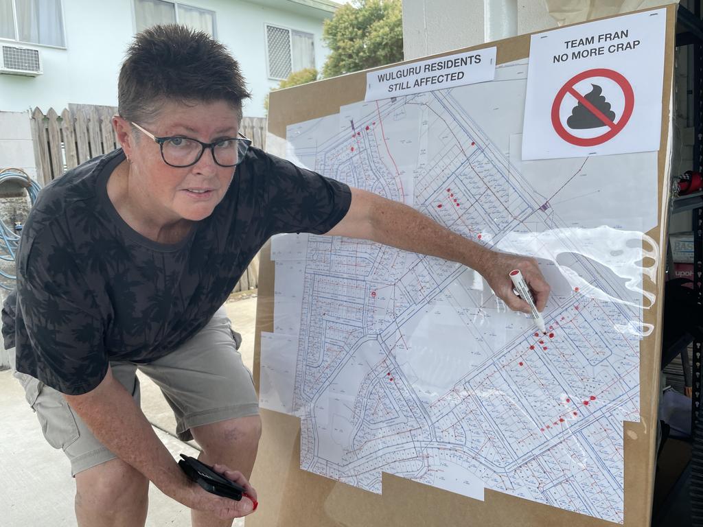 Poonami Army leader Leanne Dobbin adds more dots where properties have reported sewage flooding. Picture: Leighton Smith.