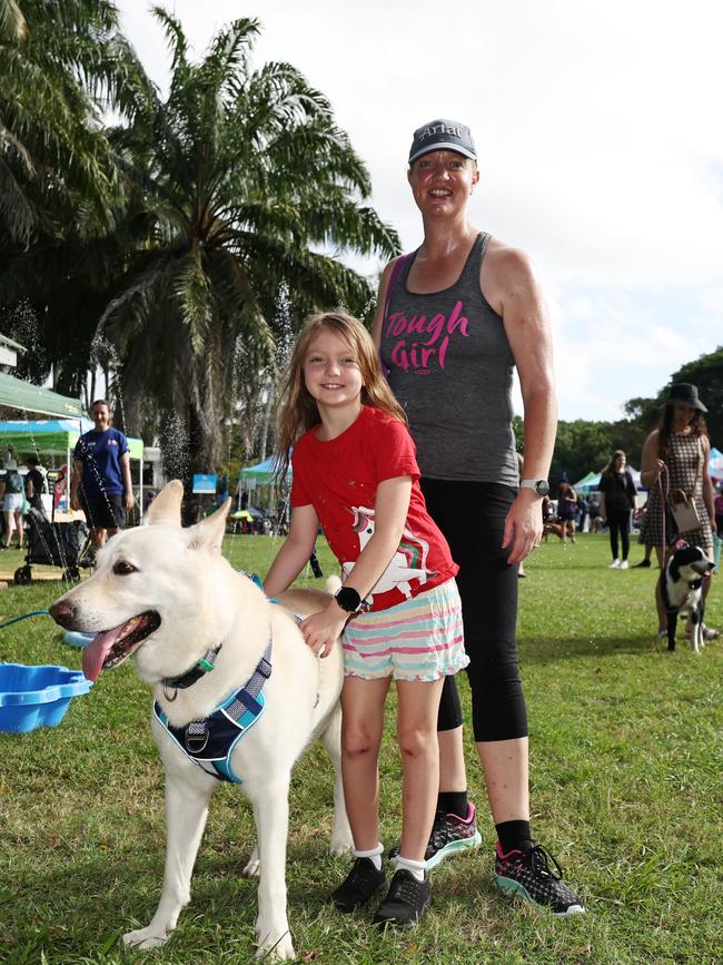 Lilith Ryan, 8, Suri Hobday and Ghost at the RSPCA's Million Paws Walk fundraiser, held along the Cairns Esplanade. Picture: Brendan Radke
