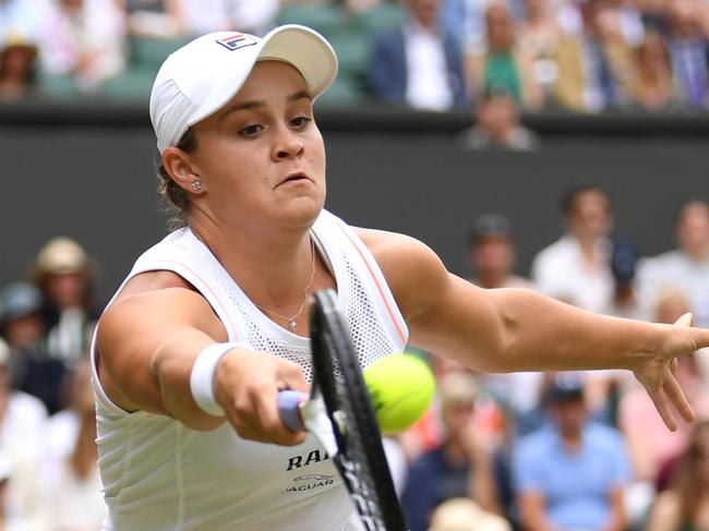 LONDON, ENGLAND - JULY 06: Ashleigh Barty of Australia plays a forehand in her Ladies' Singles third round match against Harriet Dart of Great Britain during Day six of The Championships - Wimbledon 2019 at All England Lawn Tennis and Croquet Club on July 06, 2019 in London, England. (Photo by Matthias Hangst/Getty Images)