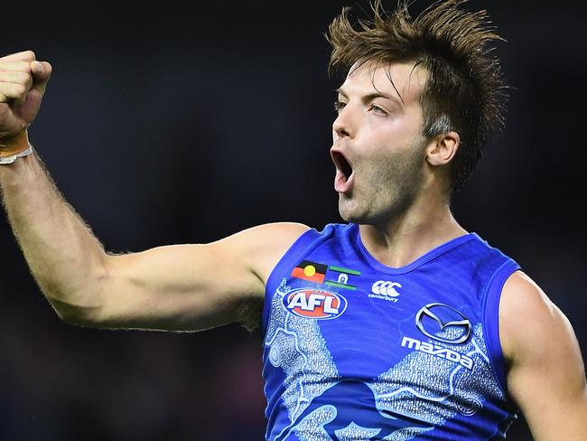 MELBOURNE, AUSTRALIA - JUNE 03:  Luke McDonald of the Kangaroos celebrates kicking a goal during the round 11 AFL match between the North Melbourne Kangaroos and the Brisbane Lions at Etihad Stadium on June 3, 2018 in Melbourne, Australia.  (Photo by Quinn Rooney/Getty Images)