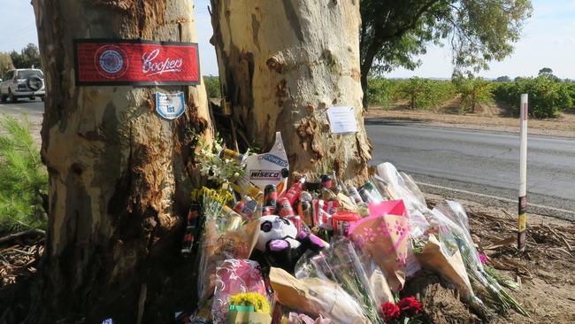 Tributes at the site of Saturday’s crash on Angaston Rd at Nuriootpa. Picture: Jason Katsaras