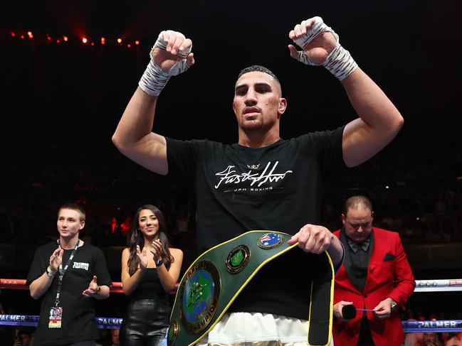 SYDNEY, AUSTRALIA - JUNE 16: Justis Huni celebrates winning his Australian heavyweight title fight against Paul Gallen at ICC Sydney on June 16, 2021 in Sydney, Australia.  (Photo by Cameron Spencer/Getty Images)