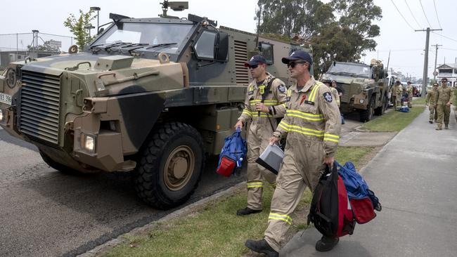 Australian Defence Force stepping in to help firefighters in Orbost, Victoria. Picture: Luis Ascui/Getty Images