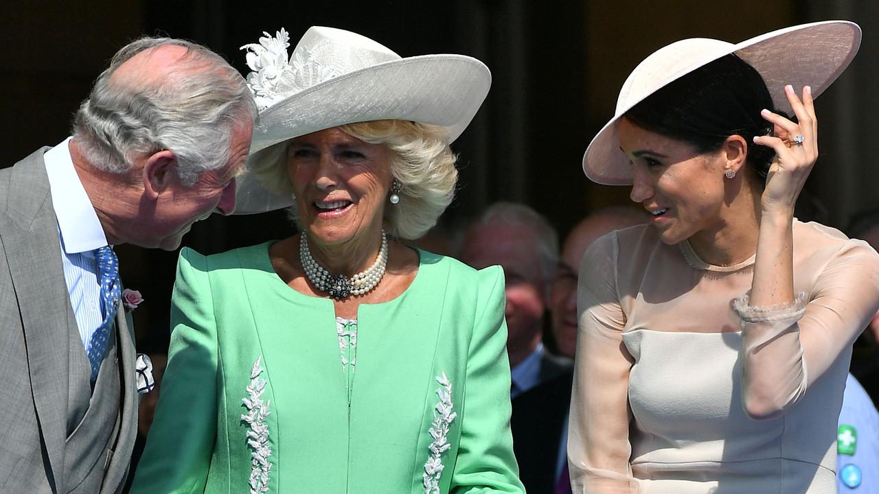 How things have changed. Prince Charles, Camilla and Meghan in May 2018. Picture: AFP Photo/Pool/Dominic Lipinski