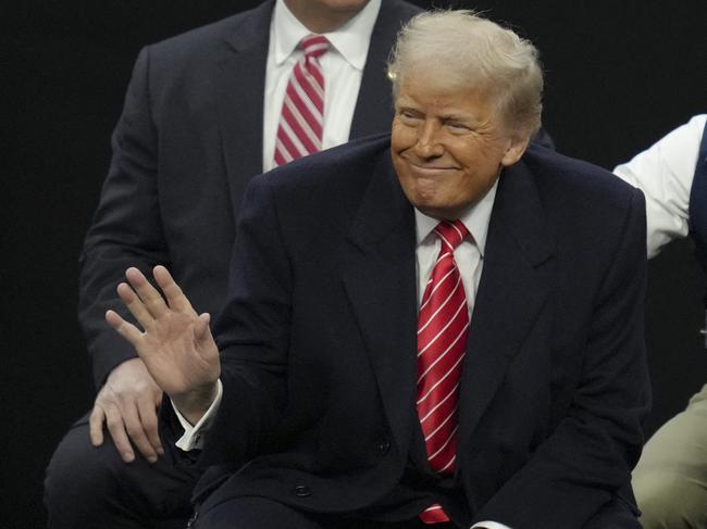 U.S. President Donald Trump salutes the crowd during the 2025 NCAA Division I Men's Wrestling Championship. Picture: Getty Images via AFP