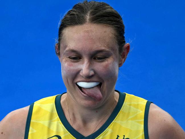 Australia's midfielder #21 Renee Taylor celebrates scoring her team's first goal in the women's pool B field hockey match between Australia and the USA during the Paris 2024 Olympic Games at the Yves-du-Manoir Stadium in Colombes on July 31, 2024. (Photo by Mauro PIMENTEL / AFP)