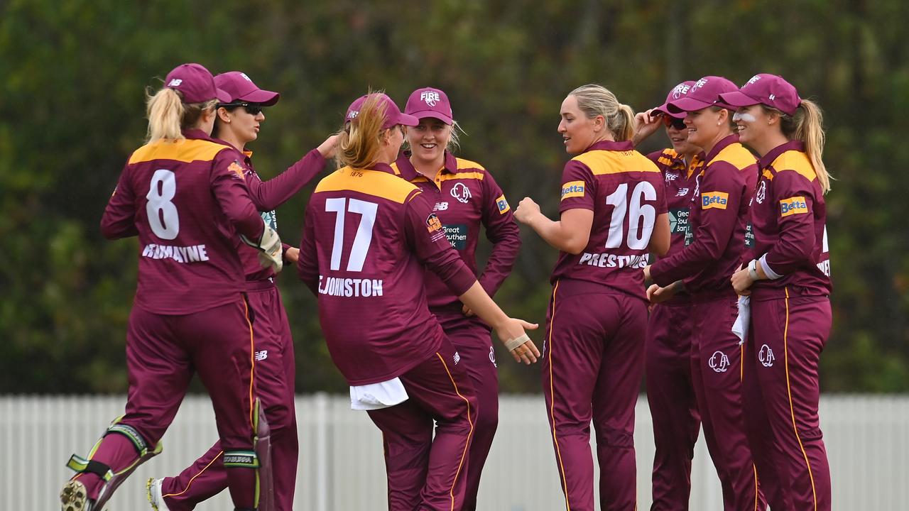 GOLD COAST, AUSTRALIA - OCTOBER 01: Queensland Fire celebrate the wicket of Bec Carter of ACT during the WNCL match between Queensland and the Australian Capital Territory at Bill Pippen Oval, on October 01, 2022, in Brisbane, Australia. (Photo by Albert Perez/Getty Images)