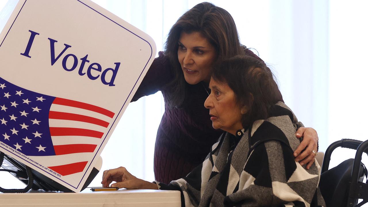 Nikki Haley helps her mother Raj Kaur Randhawa cast her ballot in the South Carolina Republican primary on February 24, 2024 in Kiawah Island, South Carolina. (Photo by JUSTIN SULLIVAN / GETTY IMAGES NORTH AMERICA / Getty Images via AFP)