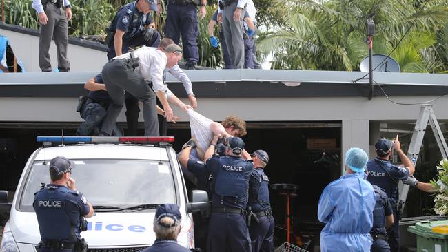 Police arrest the man. Photo: Glenn Hampson