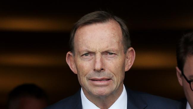 Former prime minister Tony Abbott speaks to media today. Picture: Luke Bowden