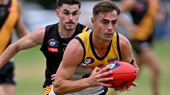 Hurstbridge’s Ethan Taylor on the run. Picture: Andy Brownbill