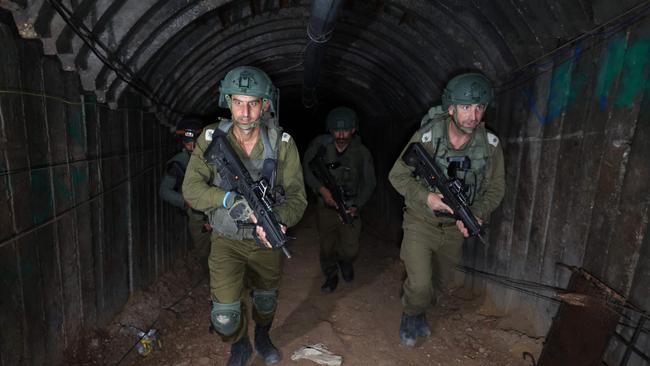 Israeli soldiers visit a tunnel that Hamas reportedly used to attack Israel through the Erez border crossing on October 7. Picture: Jack Guez/AFP