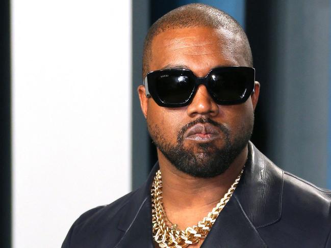 (FILES) In this file photo taken on February 9, 2020 Kanye West attends the 2020 Vanity Fair Oscar Party following the 92nd annual Oscars at The Wallis Annenberg Center for the Performing Arts in Beverly Hills. - US rapper Kanye West, recently shunned by several business partners, was escorted out of a Skechers office October 26, 2022 where he came "uninvited," the sneaker brand said in a statement. (Photo by Jean-Baptiste Lacroix / AFP)