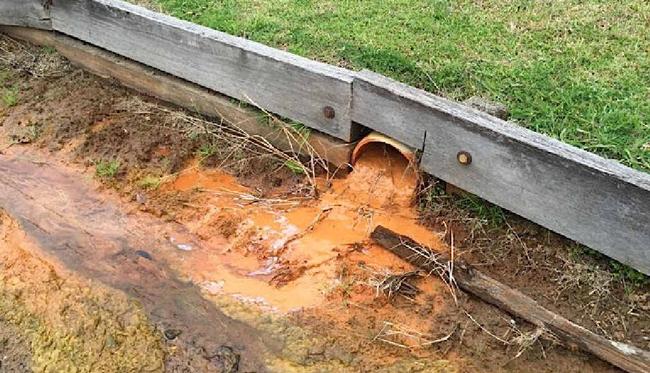 NOT UP TO SCRATCH: The letter of petition says drains like this one on Orchid Rd are not only unsightly, but unsafe too. Picture: Contributed