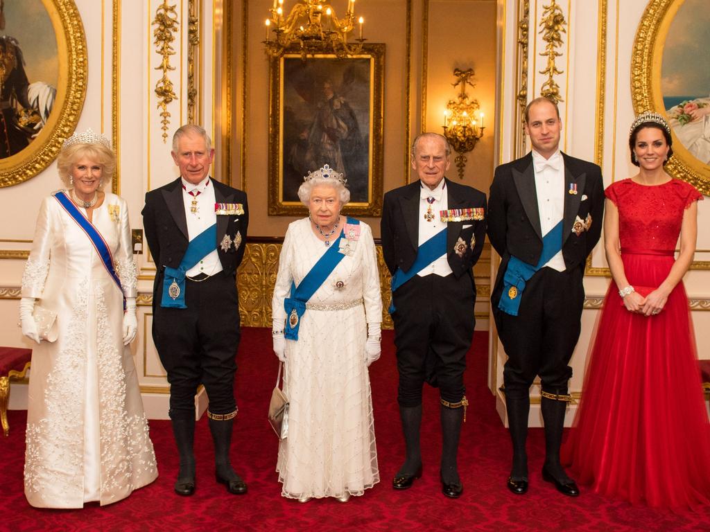 (Left to right) The Duchess of Cornwall, the Prince of Wales, Queen Elizabeth II, the Duke of Edinburgh, and Duke and Duchess of Cambridge arrive for the annual evening reception for members of the Diplomatic Corps at Buckingham Palace, London. Picture date: Thursday December 8, 2016. Photo credit should read: Dominic Lipinski/PA Wire