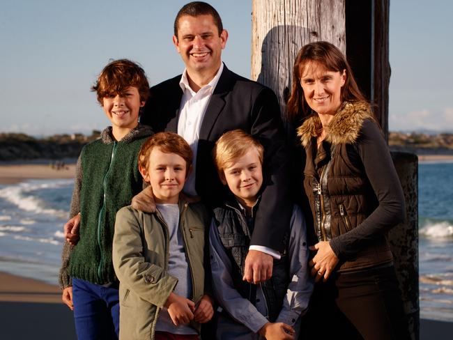 Kyam Maher with his wife Carmel and sons Marley, Jai and Flynn at Noarlunga Beach. Picture: Matt Turner.