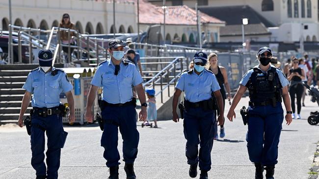 NSW Police officers patrol Bondi Beach in Sydney a week before the vaccination mandate for the force. Picture: NCA NewsWire/Bianca De Marchi