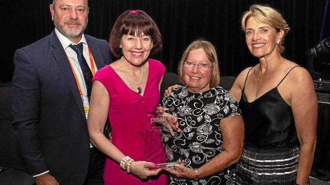 Brent and Leanne from Peak Services with Deputy Mayor Kathy Duff and Ros Lenton, widow of Butch Lenton, at the LGAQ awards ceremony in Cairns. Picture: Ros Heit