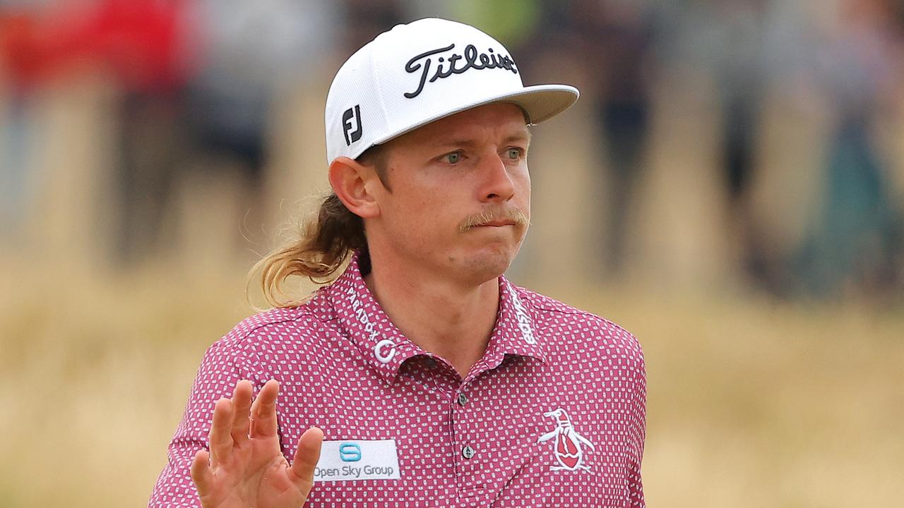 ST ANDREWS, SCOTLAND - JULY 17: Cameron Smith of Australia reacts on the 17th green during Day Four of The 150th Open at St Andrews Old Course on July 17, 2022 in St Andrews, Scotland. (Photo by Kevin C. Cox/Getty Images)