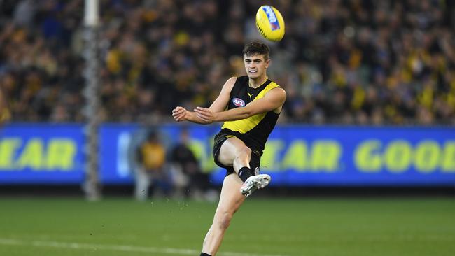 Patrick Naish in action for Richmond during his AFL debut against Geelong on Friday, June 7, 2019. (AAP Image/Julian Smith)