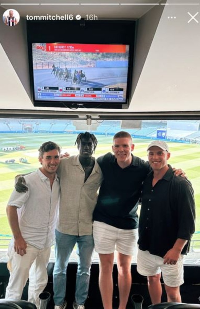 Tom Mitchell with former Hawthorn teammate Changkuoth Jiath at the Boxing Day Test.