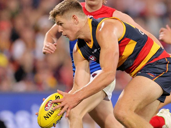 ADELAIDE, AUSTRALIA - MAY 22: Nick Murray of the Crows handballs in the final seconds during the round 10 AFL match between the Adelaide Crows and the Melbourne Demons at Adelaide Oval on May 22, 2021 in Adelaide, Australia. (Photo by Daniel Kalisz/Getty Images)