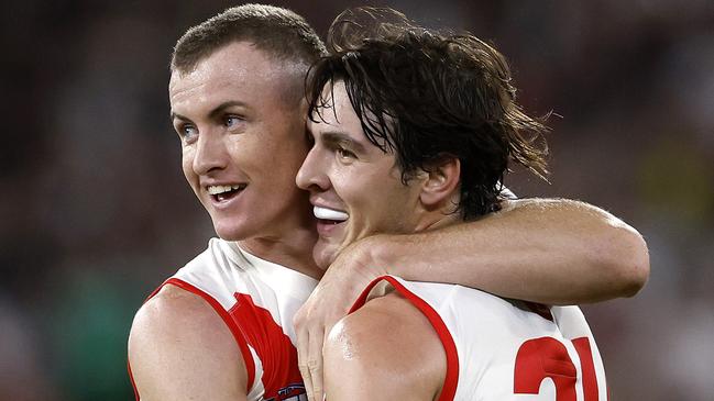 Sydney's Chad Warner and Errol Gulden celebrate setting up a goal to Logan McDonald during the Round 1 AFL match between the Collingwood Magpies and the Sydney Swans at the MCG on March 15, 2024. Photo by Phil Hillyard(Image Supplied for Editorial Use only - Phil Hillyard  **NO ON SALES** - Â©Phil Hillyard )