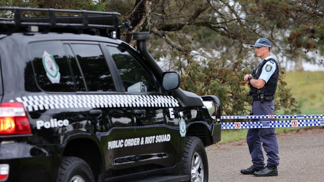 The Riot Squad were also brought in to help conduct line searches. Picture: NCA NewsWire / Damian Shaw