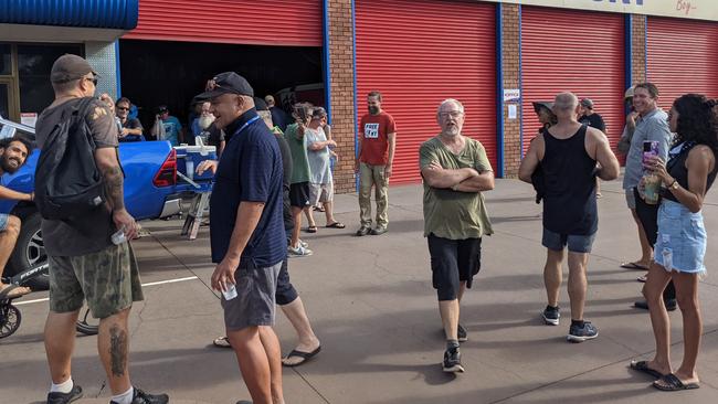 Anti-mandate and anti-vaccination demonstrators rallied at Windscreens Territory, Coconut Grove on Monday January 10, after it was shut down for not complying with the chief health officer'&#128;&#153;s directions. Picture: Zizi Averill