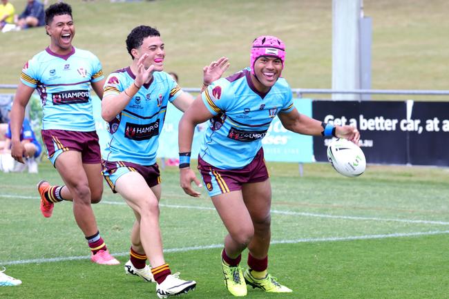 Joey Tupuse scores a try. Photo Steve Pohlner