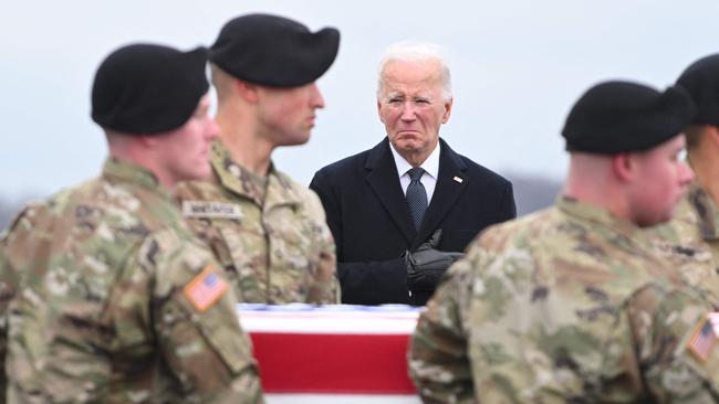 Joe Biden watches the arrival at Dover Air Force Base in Delaware of the remains of three US service members killed in the drone attack on the US military outpost in Jordan. Picture: AFP